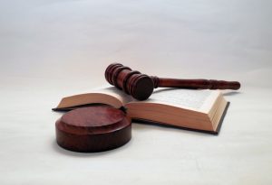 Alpharetta Domestic Violence Defense Attorney Canva Justice Law Hammer 300x205